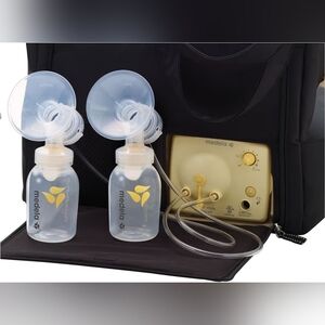 Medela Breast Pump with Bottles